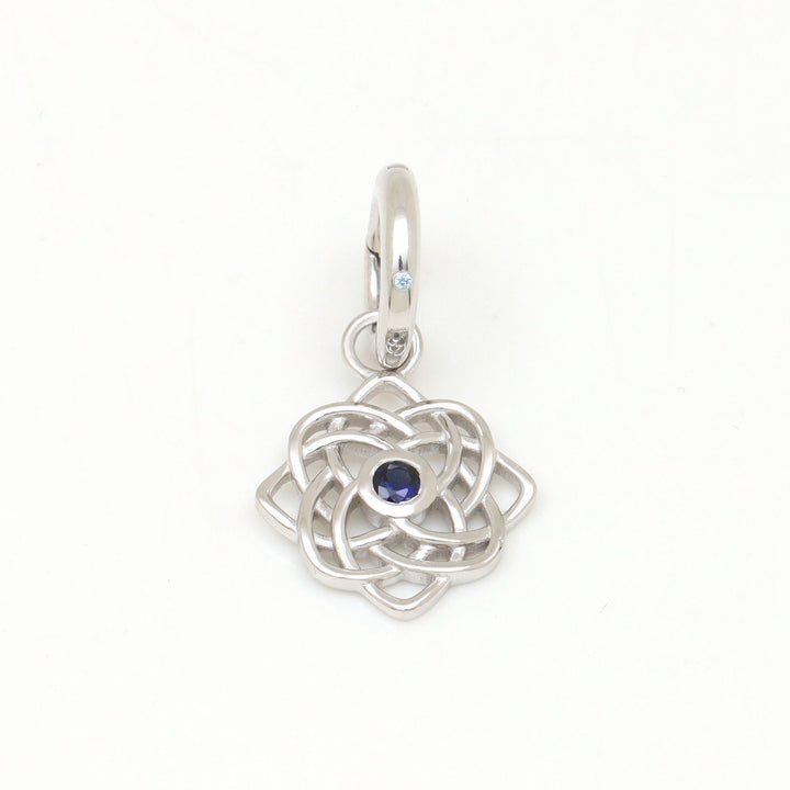 DIVETIA Bound charm with lab-grown sapphire in rhodium-finished sterling silver, front view